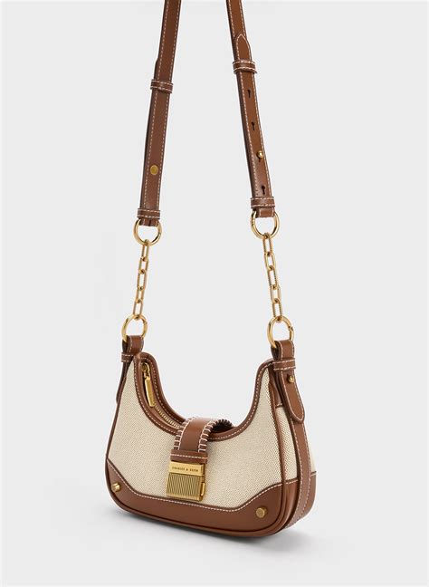 Chocolate Winslet Canvas Belted Hobo Bag .